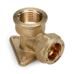 Brass plumbing wall plate elbow on a white background
