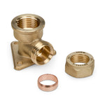 Brass plumbing fitting with nut and an olive on a white background