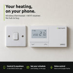 ENGO E901-WIFI on the wall next to a light switch