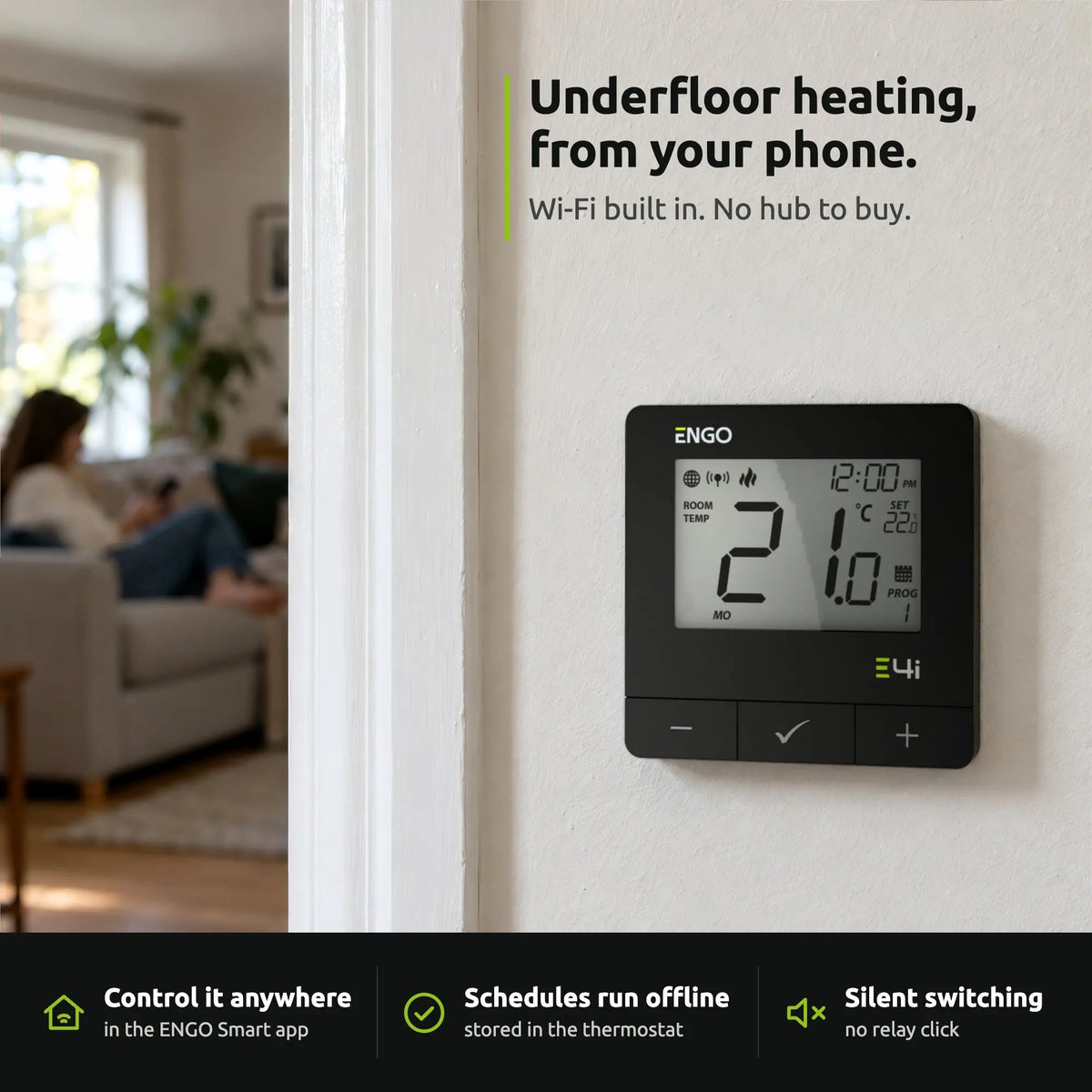 ENGO E4i black thermostat on a hallway wall: underfloor heating controlled from your phone
