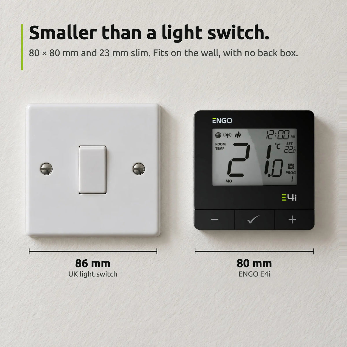 ENGO E4i black thermostat beside a UK light switch: 80 mm against 86 mm